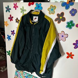 1990's green and yellow vintage nike windbreaker jacket